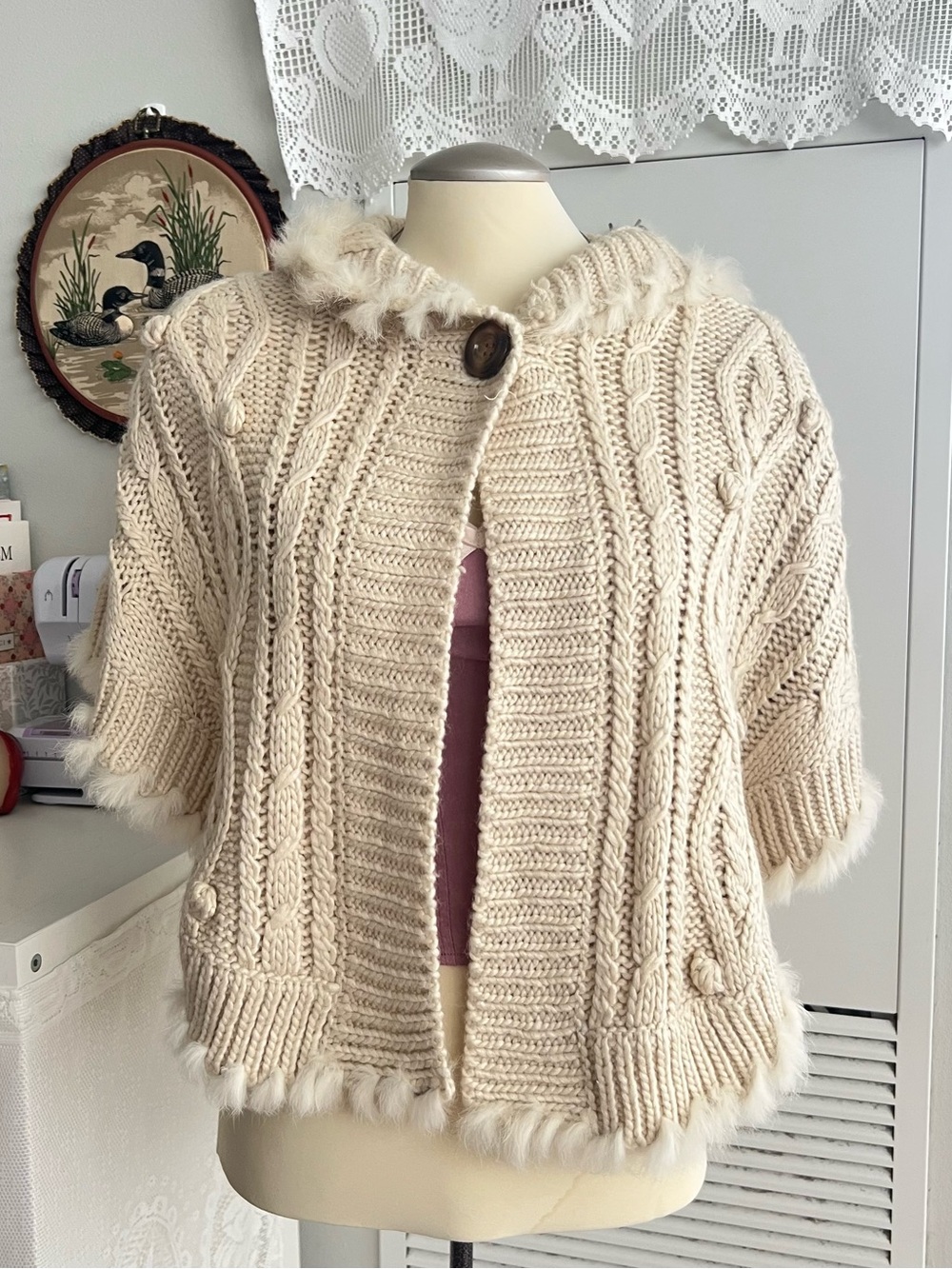 Cream cable knit wool blend cardigan shawl cloak with rabbit fur trim and button
